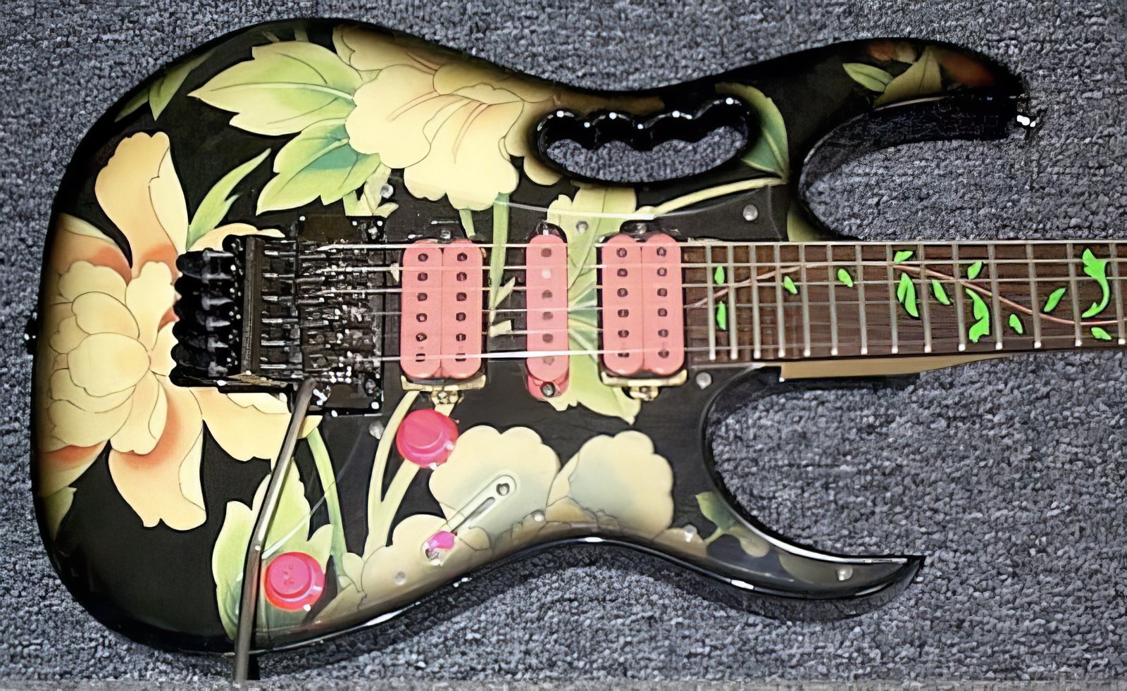 1992 Ibanez JEM77-FP — body close-up, monkey grip, pink pickups, clear pickguard, floating tremolo