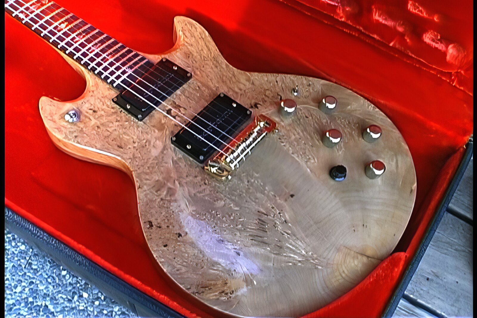 1979 Moonstone Vulcan Deluxe — body front in red-lined case with Bartolini humbuckers and gold bridge